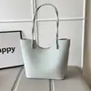 Bolso de hombro casual versátil de gran capacidad para estudiantes nuevos 2026, bolso de moda para mujer para el trabajo en verano