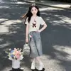 Conjunto de Verano para Niña 2026 Estilo Nuevo Niña Grande Camiseta de Manga Corta Estilo Coreano Infantil Pantalones de Mezclilla Anchos de Verano