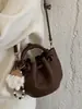 Bolsa de mão vintage de alta qualidade para mulheres, nova moda 2026, bolsa transversal estilosa e versátil, bolsa tipo saco texturizada para o dia a dia