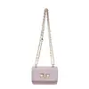 El popular bolso cuadrado pequeño y dulce para mujer de este año es el nuevo bolso de hombro con cadena de lunares para el verano 2026, bolso cruzado versátil