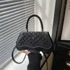Bolsa Cruzada Casual de Diseño de Nicho Nuevo Verano 2026 Bolso de Mujer Textura Simple Bolso Cuadrado Pequeño Bolso de Mano de Moda