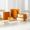 Caja de joyería desplegable naranja Hermes para anillos, collares y pendientes, caja de embalaje, caja de regalo para joyería, directo de fábrica, en stock para venta al por mayor
