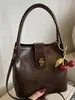 Bolsa Pequena Casual Retrô para Mulheres 2025 Outono Nova Tendência Bolsa de Mão para Passeio Popular Bolsa de Ombro Único Transversal Bolsa de Balde