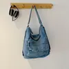 Bolso de hombro de mezclilla de alta gama para mujer, nueva moda 2026, bolso cruzado casual versátil multifuncional, bolso para el trabajo
