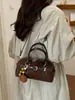 Bolso de hombro cruzado retro de nicho estilo coreano para mujer, bolso de mano moderno y versátil, nuevo modelo 2026, bolso de alta gama para el día a día