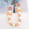Nueva Cadena de Mano Acrílica de Colores Dulces con Lazo Deslumbrante, Colgante para Bolso, Accesorio DIY para Funda de Teléfono