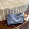 Nuevo bolso de axila de estilo coreano de nicho para otoño/invierno para mujer, bolso de hombro retro, bolso cruzado versátil para el día a día, bolso de mano de alta gama