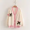 Coleção Outono 2026: Jaqueta suéter com laço tridimensional estilo japonês para mulheres, design casual com um toque jovem, cardigã de tricô