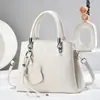 Bolso Cruzado de Hombro Único para Mujer de Color Sólido Nuevo Gran Capacidad Elegante Versátil para el Trabajo de Mano Cuadrado
