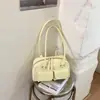 Moda para Viajes Cotidianos Simple Gran Capacidad Primavera 2026 Nuevo Estilo Bolsillo Doble Elegante Brillante Bolso de Hombro Único Bolso de Axila