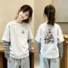 Camiseta de manga longa de primavera para meninas 2026 novo modelo camiseta básica de primavera e outono infantil estilo coreano roupas infantis top estiloso 100% algodão