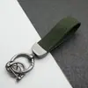 Colgante Llavero de Coche de Cuero Gamuzado Anillo de Resorte de Aleación de Zinc Cubierta de Llave Cadena de Llave con Logo de Coche Venta al por Mayor