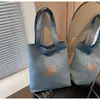 Bolsa de Lona Nueva Transfronteriza 2026 Gran Capacidad Estudiante Viajero Bolso de Hombro Tote Estampado Lindo Estilo Fresco para Estudiantes