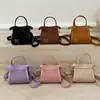 2025 Nueva Bolsa de Invierno para Niños Bolso Mini de Color Sólido Simple para Bebé Bolso de Hombro Medio para Niños Estilo Coreano