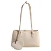 Bolso tote grande de estilo francés de alta gama, minimalista y versátil para mujer, para transmisión en vivo transfronteriza, bolso de mano y bolso de hombro texturizado para el día a día