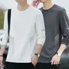 Camiseta casual versátil de manga larga para hombre para otoño, cuello redondo, color liso moderno, cómoda, transpirable y de corte holgado.