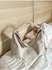 Bolso de lona lavado estilo casual para mujer, bolso cruzado de gran capacidad, bolso de hombro artístico para jóvenes, bolso tote japonés y coreano al por mayor