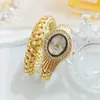 Bestseller internacional JUSMI pulseira relógio feminina de luxo, liga metálica com diamantes entrelaçados relógio de pulso aberto a quartzo