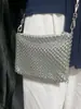 2025 Nuevo Bolso de Diseño de Nicho Cortado Tejido a Mano de Plata Brillante de Gama Alta Bolso de Hombro Casual con Cuentas de Flores Pequeñas