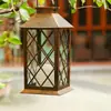 Nova lanterna solar de vela transfronteiriça, estilo vintage de arte em ferro, luz decorativa para jardim externo e pátio