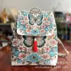Mochila de estilo étnico de Yunnan color arena, bolsa de viaje y ocio para mujer, nuevo diseño con bordado de hilo dorado, un imprescindible para vendedores ambulantes