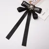 Envío gratis XXIV modelo nuevo lazo de encaje negro estilo princesa broche de lazo corsage nueva ropa para mujer