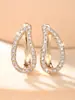 Brincos de Clipe de Orelha Gota Cheios de Diamantes Levemente Luxuosos Mais Vendidos Transfronteiriços, Elegantes e Versáteis, Brincos de Design de Nicho de Alta Qualidade para Mulheres