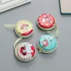 Porta-moedas Redondo Criativo de Folha de Flandres Bolsa de Armazenamento de Desenho Animado para Moedas Fones de Ouvido Mini Bolsa com Zíper Atacado Transfronteiriço