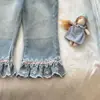 Calça jeans feminina com detalhes em renda para primavera e outono, cintura elástica estilosa, calça longa flare versátil, calça de bebê menina, azul