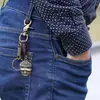 Llavero de piel de vaca vintage para hombre, directo de fábrica punk, con máscara de aleación, colgante decorativo, zona turística, gran oferta