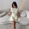 Top de punto moderno y juvenil de corte ajustado para mujer, manga corta de verano, elegante y que realza la figura, adecuado para ir al trabajo.