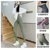 Pantalones de tiburón para mujer ropa exterior cintura cruzada control de abdomen levantamiento de glúteos pantalones deportivos de yoga estilo delgado sin líneas vergonzosas cintura alta sin costuras pantalones base