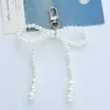 Nuevo Estilo de Nicho Llavero Colgante de Lazo de Perlas Lindo Moda para Mujer Distintivo Decorativo para Bolso Cadena Colgante para Teléfono Móvil