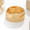 Fornecimento direto transfronteiriço para a Europa e América: Estilo minimalista, pulseira aberta única de liga metálica com textura côncava-convexa para mulheres