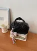 Nuevo bolso de mano de rombos transfronterizo, bolso de hombro casual de nicho para el día a día tipo bowling, versión coreana versátil de alta gama para mujer