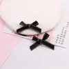 Nuevo estilo borde dorado cinta acanalada moño pequeño DIY ropa muñeca caja de regalo decoración zapatos y sombreros accesorios a juego