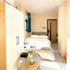 Mobiliario Hotel Jiayu Habitación Estándar Juego Completo de Colgador de Ropa, Gabinete de Té, Diseño e Instalación de Caja de Cama para Renovación, Fábrica de Origen de Mobiliario
