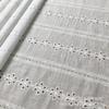 Tela de algodón jacquard hueco horizontal bordado a máquina completo directo de fábrica al por mayor para ropa primavera, verano y otoño
