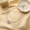 Collar con colgante en forma de U de titanio y acero de lujo de alta gama transfronterizo europeo y americano para mujer cadena joker para clavícula no se decolora venta al por mayor