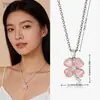 Collar de titanio estilo coreano y japonés con piedra ojo de gato y trébol de cuatro hojas, cadena para la clavícula, lujo ligero de nicho, simple, versátil, suave, para mujer