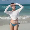 Novo biquíni feminino azul de duas peças estilo ins com saída de praia de manga comprida, conjunto de três peças com proteção solar para férias em fontes termais
