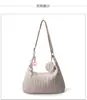 Bolsa Feminina de Ombro Único Estilo Coreano 2025 Nova Grande Capacidade Moda Versátil para o Dia a Dia Bolsa Transversal Bolsa para Estudante Universitário Bolsa de Braço