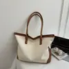 Bolsa de Lona de Gran Capacidad para Mujer 2026 Nuevo Otoño Versátil para el Viaje Diario Bolso Tote de un Solo Hombro Bolso de Mano para Madre e Hijo