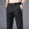 Pantalones para hombre al por mayor, holgados y versátiles, estilo nuevo de moda, pantalones ultradelgados de secado rápido, pantalones largos, pantalones de seda helada, estilo de verano fino para hombre