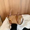 Bolso de gamuza para mujer, nuevo y moderno estilo retro de otoño 2026, adecuado para ir al trabajo, bolso de hombro, bolso cruzado, bolso tipo cubo