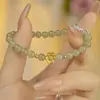 Pulsera Primaveral Estilo Chino Super Etérea con Alto Valor Estético, Diseño de Lirio del Valle, Versátil, Perfecta como Regalo para Novia, Regalo de Cumpleaños