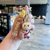 Llavero de Bolsa con Forma de Corazón Transfronteriza Colgante de Muñeca Linda Llavero de Coche Pequeño Regalo Mayoreo
