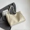 Bolso de hombro para mujer Shuai Mi Jia 2026 otoño nuevo, color liso, gran capacidad, bolso tote, bolso de mano elegante y texturizado