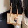 Bolsa Grande de Couro Estilo Coreano para Mulheres 2025 Verão Nova Casual Simples Bolsa de Ombro para Trabalho e Deslocamento Bolsa Tote