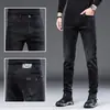 Jeans preto de alta qualidade Hong Kong primavera-verão para homens 2026 novo elástico slim perna reta casual calça comprida